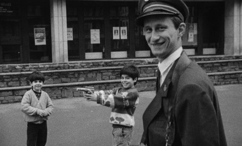 Ben Interacts with Children Playing with a Toy Gun