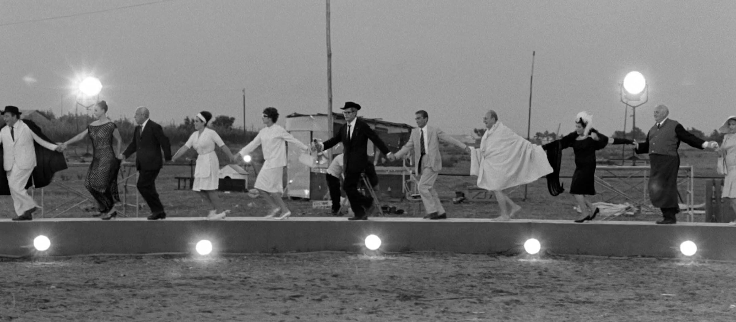 Everybody Dances in a Circle Holding Hands