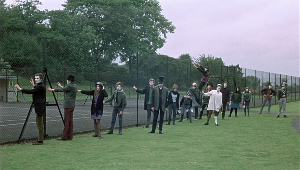 The Mime Troupe Watches a Fake Tennis Match