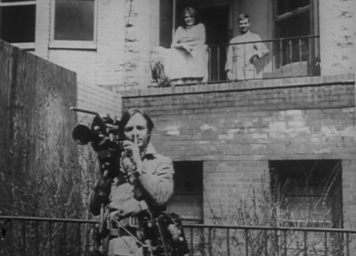 David Poses for a Photo with Some Neighbors