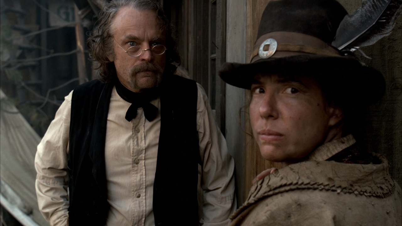 Brad Dourif as Doc and Robin Weigert as Jane