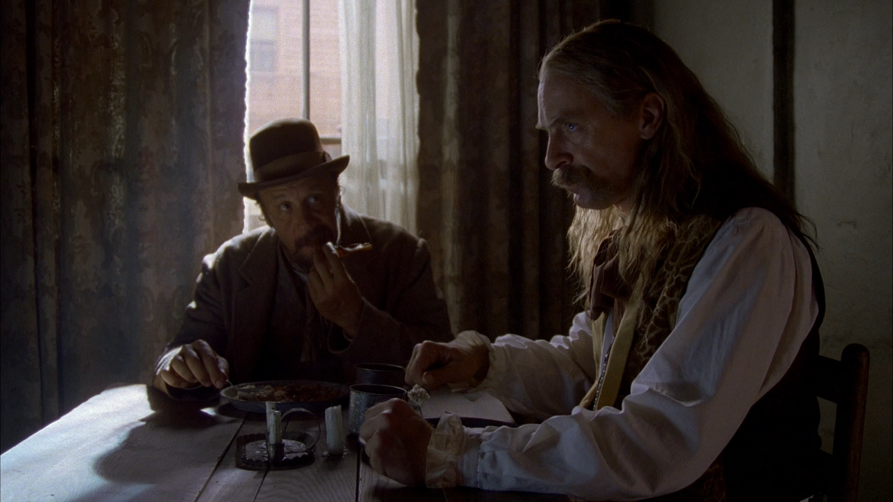 Dayton Callie as Charlie Utter and Keith Carradine as Wild Bill Hickock