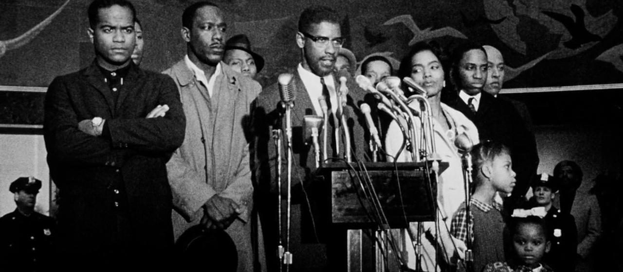 Denzel Washington as Malcolm X