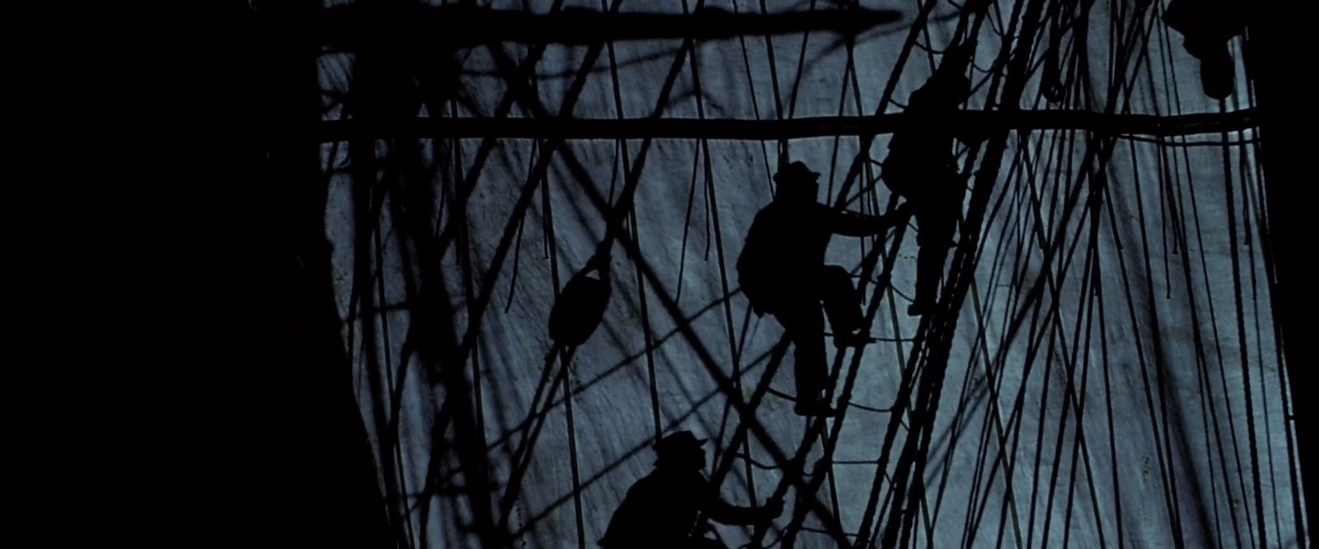 Sailors Climb in Silhouette