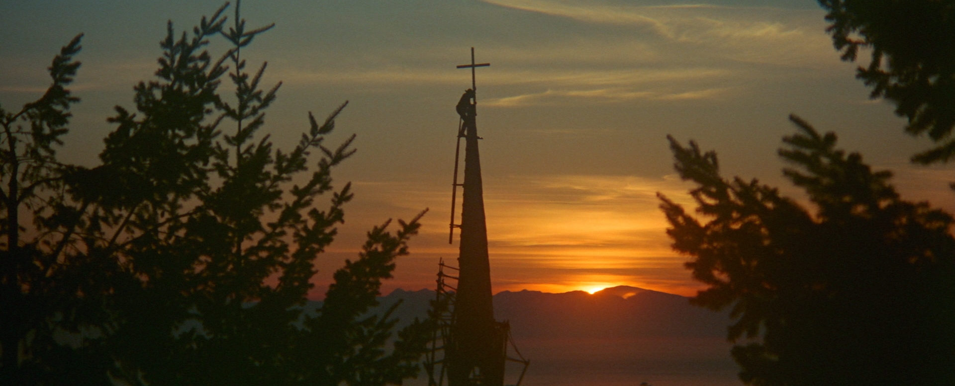 The Sun Sets Behind the Church Steeple